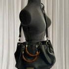 Andrew Marc Black Pebbled Faux Leather Handbag With Wooden Handles - Image 2