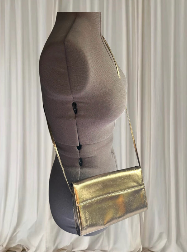Hermes Metallic Gold Envelope Crossbody Bag - Elegant Evening Accessory - Image 1