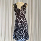 Conspiracy Vintage Sleeveless Dress - Elegant Black and White Leaf Print with Ruffles - Image 2