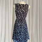 Conspiracy Vintage Sleeveless Dress - Elegant Black and White Leaf Print with Ruffles - Image 5