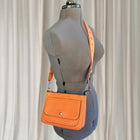 Louenhide Crossbody Bag - Stylish Patterned Strap in Vibrant Orange - Image 1