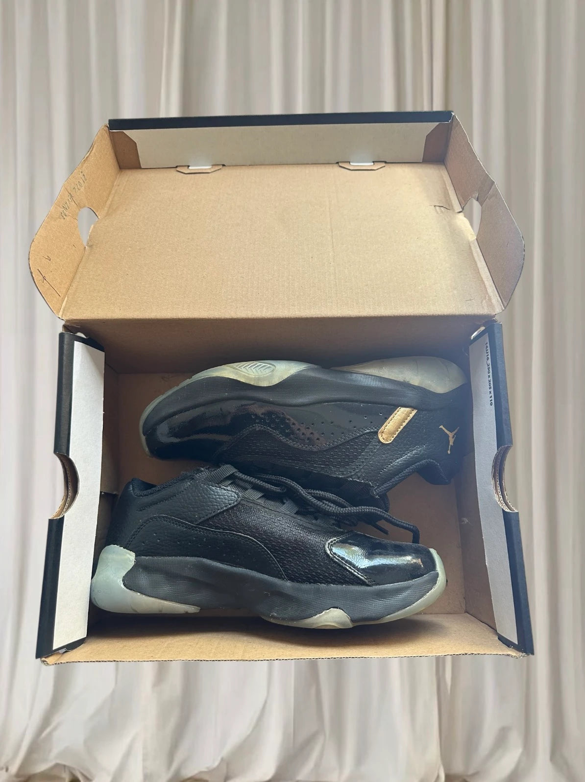 Jordan Air Jordan 11 CMFT Low Sneakers - Black Gold Youth Size 4Y - Image 1