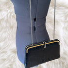 Vintage black crocodile-pattern clutch with chain shoulder strap